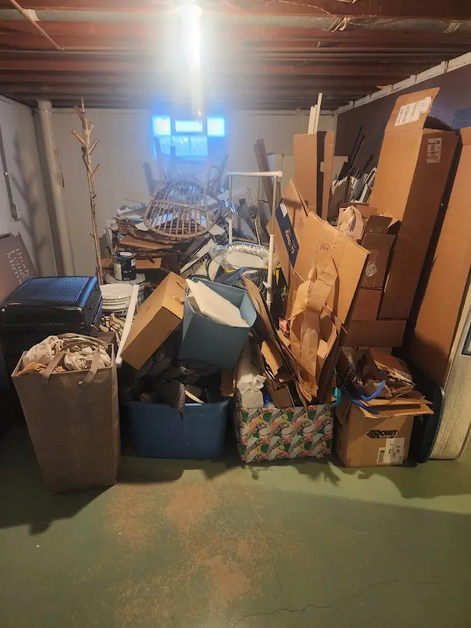 Roll-off dumpster container at job site for Yard Waste Dumpster Rental in Independent Hill